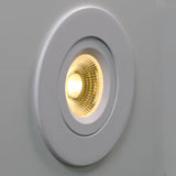 WHITE 4" slim LED gimbal downlight with selectable CCT for sleek, adjustable directional lighting.